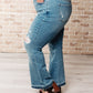 Isla Mid Rise Distressed Released Hem Bootcut Jeans