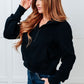 Under Her Spell Half Zip Pullover in Black